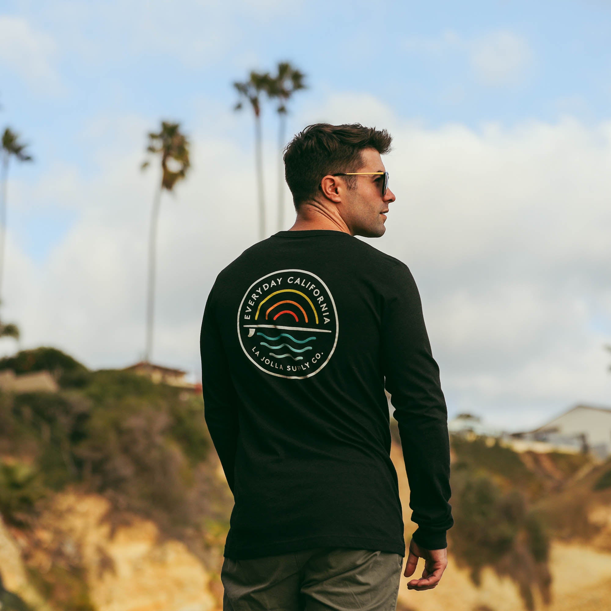 Our best selling Cabrillo tee, but made for colder weather. Pretend that summer never has to end with this relaxed tee. Sun, surf and sea graphic on the front and back.  